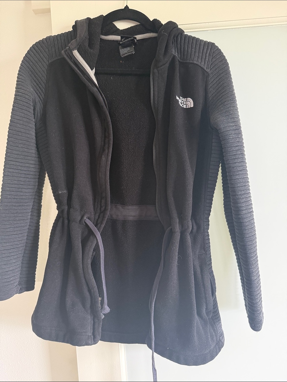 The North Face Black Hooded Fleece Jacket with Ribbed Sleeves